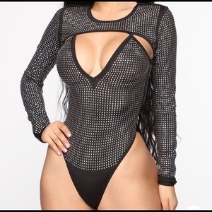 Black studded bodysuit and studded heels